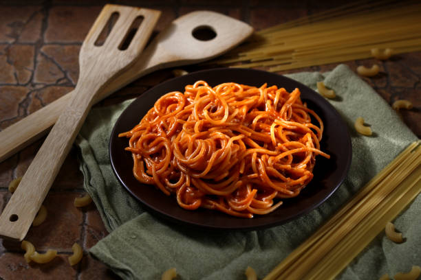 Freshly cooked spaghetti pasta with tomato sauce on a plate