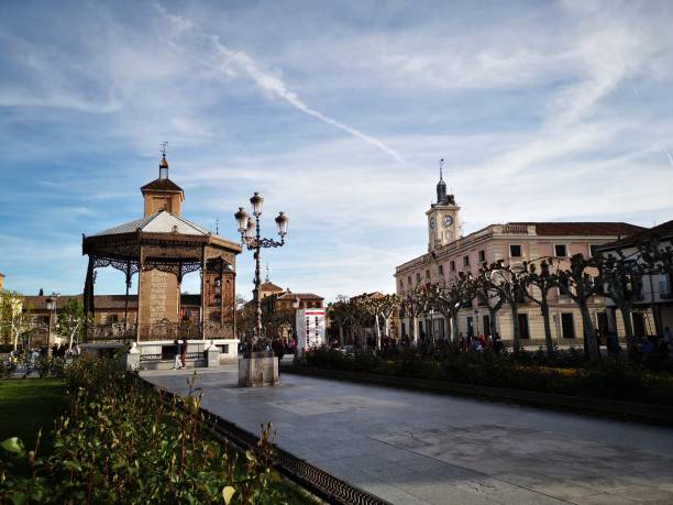 Cervante's square in Alcalá de Henares and the city hall Plaza Cervantes in Alcalá de Henares and town hall alcala de henares stock pictures, royalty-free photos & images