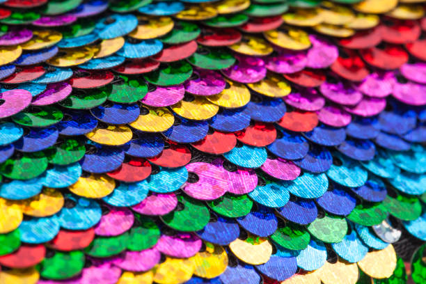 istock Pattern made of colorful rainbow sequins. 1143427335