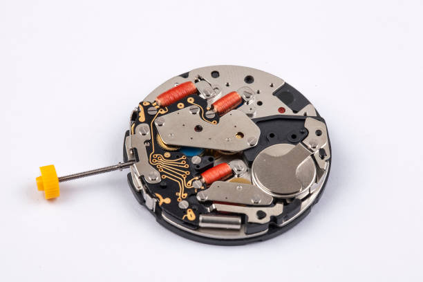 istock quartz wristwatch movement in old clock isolated 1143427373