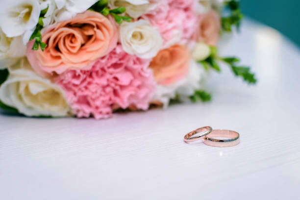 istock Wedding rings and bridal bouquet 1143431295