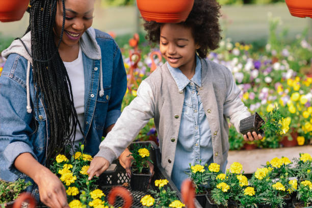 istock Mother And Daughter Gardening 1143433718