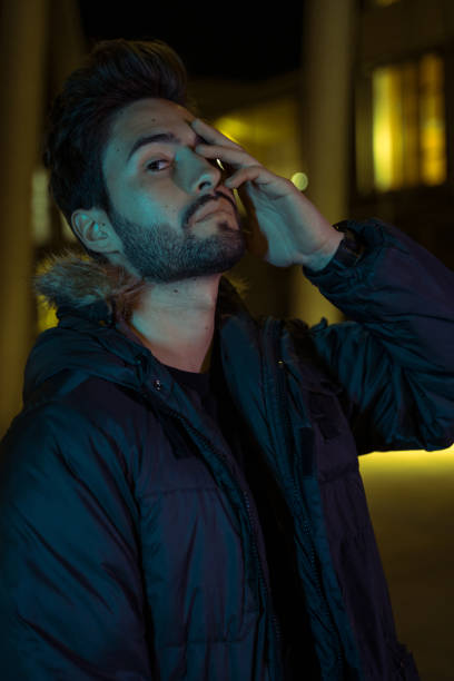 istock Young man in the city at night 1143433867