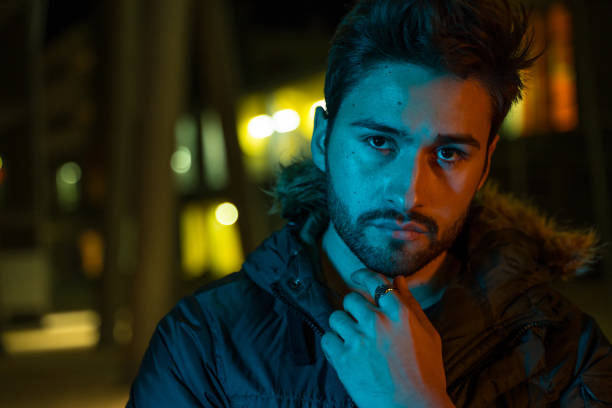 istock Young man in the city at night 1143433936