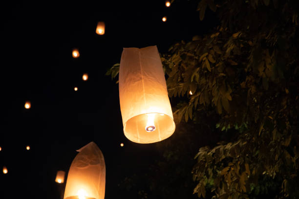 istock Loi Krathong and Yi Peng released paper lanterns on the sky during night 1143434017