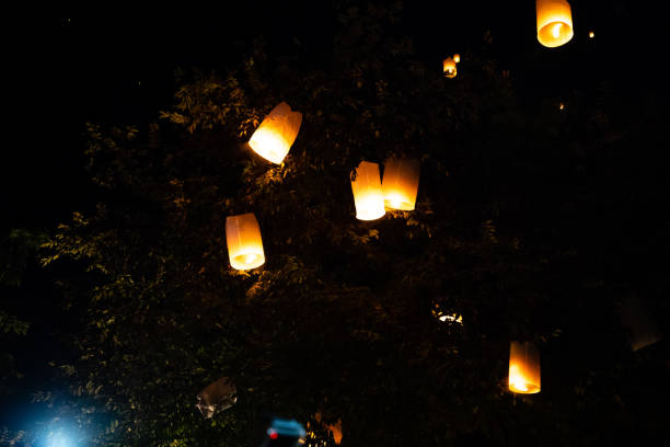 istock Loi Krathong and Yi Peng released paper lanterns on the sky during night 1143434061