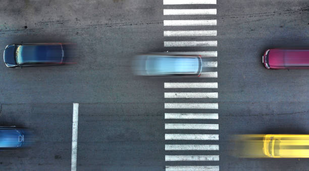 istock Car traffic through a pedestrian crossing. 1143438996