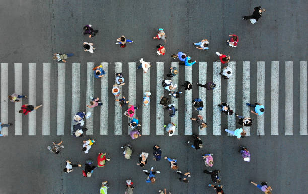 istock Aerial. Pedestrian crowd crossing. Top view. 1143439040