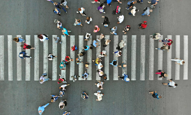 istock Aerial. Pedestrian crowd crossing. Top view. 1143439062