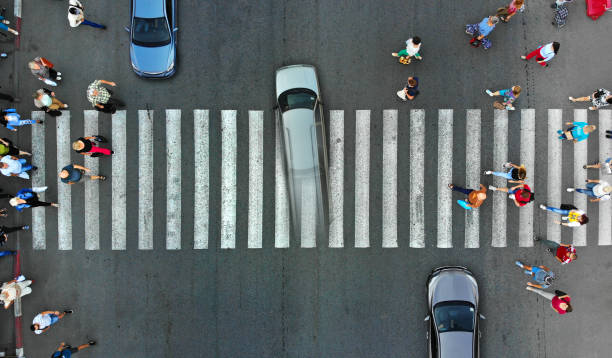 istock Aerial. Pedestrian crowd crossing. Top view. 1143439122