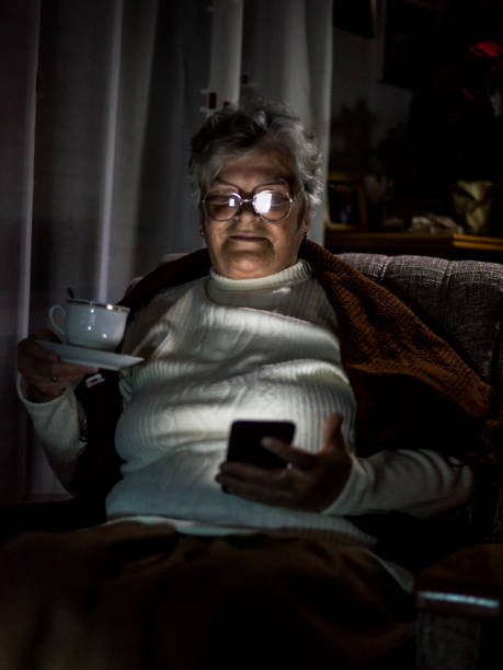 istock Senior woman using mobile phone 1143441833