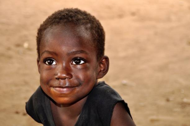 istock Smiling Boy Looking Away On Land 1143443086