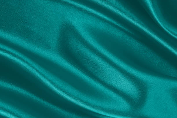 Turquoise satin background stock photo