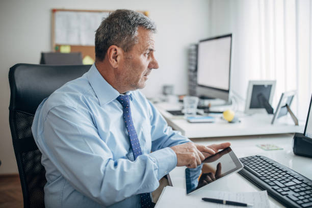 istock The businessman works in the office 1143453844