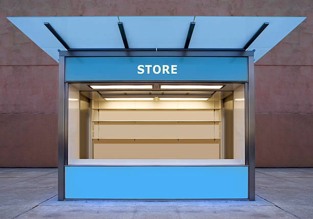 An empty store kiosk on the side of a road