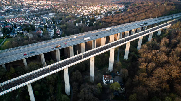 istock Highway and railroad bridge - aerial view 1143460456