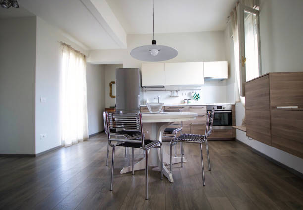 istock modern kitchen with furniture and table with chairs 1143460546