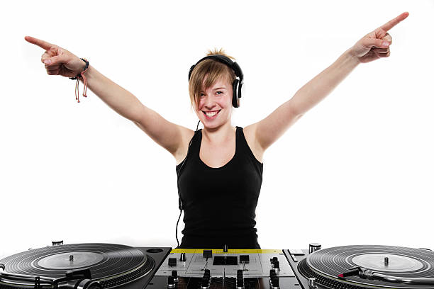 Attractive late teen chick playing music from vinyl