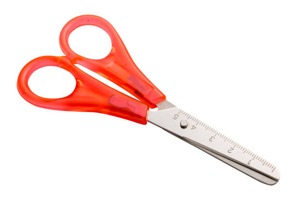 istock steel scissors with red plastic handles, on a white background 1143463159