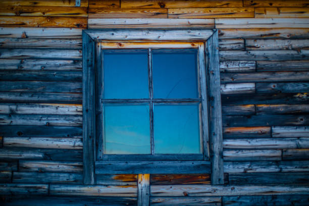 istock A Shed Window Reflecting the Blue Skies 1143463799