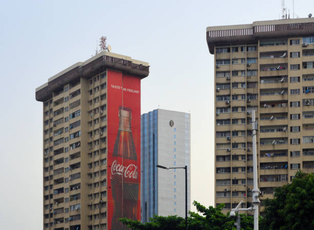 Lagos, Nigeria: Eko Court Complex, Kofo Abayomi Road, residential condos and apartments belonging to the Lagos State Government - Intercontinental Hotel in the background - Coca-Cola ad, Victoria Island