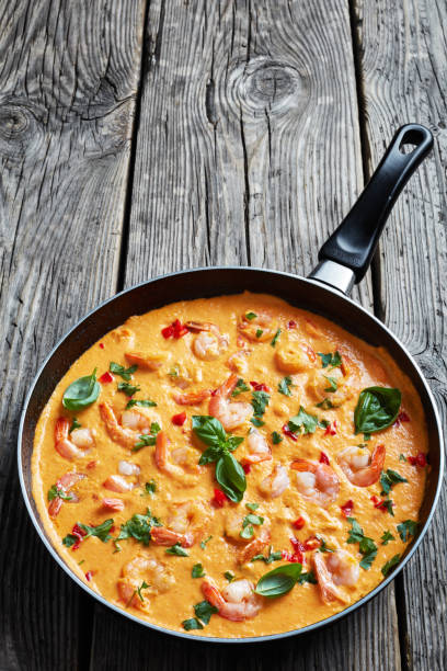 istock creamy Shrimps in Coconut Sauce, top view 1143464793