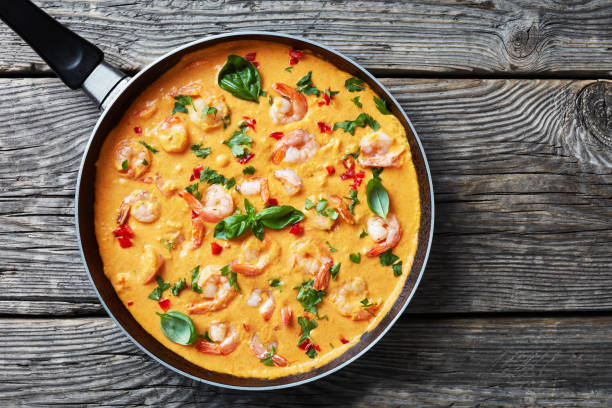 istock One Pot Shrimps in Coconut Sauce, top view 1143464837