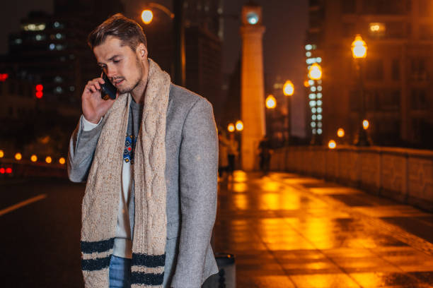istock Man talking on phone while waiting for taxi 1143470964