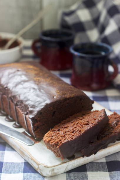 istock Vegan Mexican chocolate cake with chili, cinnamon and chocolate icing served with coffee. 1143471747