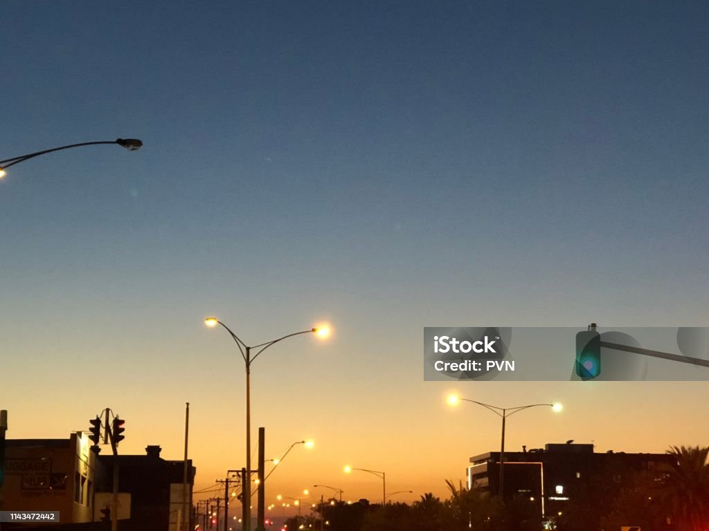 Sunset traffic lights Traffic lights at sunset Australia Stock Photo
