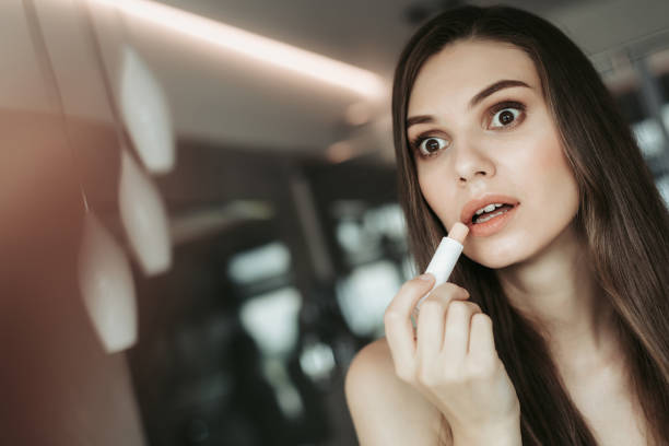 istock Shocked young female applying the makeup inside 1143473062