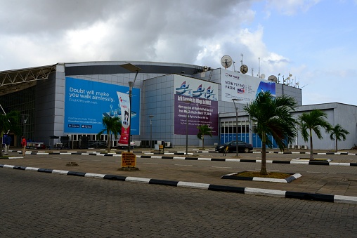 Lagos, Nigeria: Murtala Muhammed International Airport - Domestic Terminal (Terminal 2, aka MMA2), ads for Peace Air, Arik... - Ikeja Airport