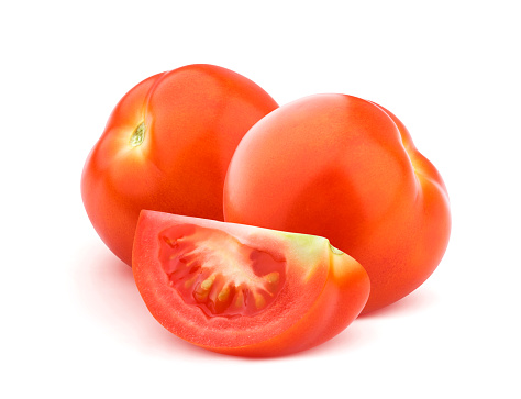 Tomato isolated on white background with clipping path, two whole and one cut red tomatoes