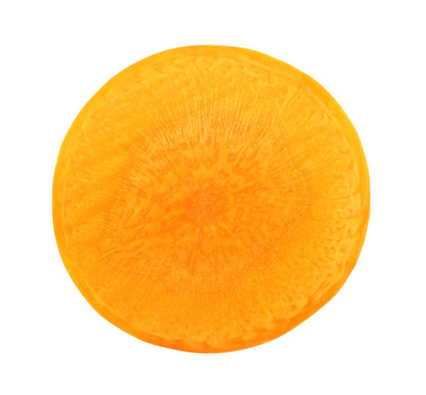 istock Carrot cut in half across isolated on white background with clipping path. 1143494157