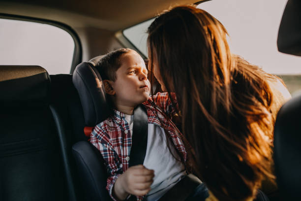 istock Mother and son driving in a car 1143494407