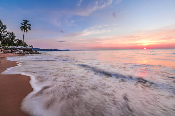istock beach and sea in sunset 1143494624