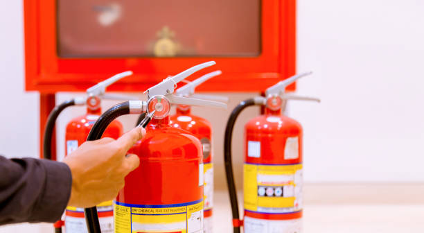 istock Male Professional inspection Fire extinguisher,safety concept. 1143496212