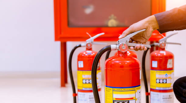 istock Male Professional inspection Fire extinguisher,safety concept. 1143496320