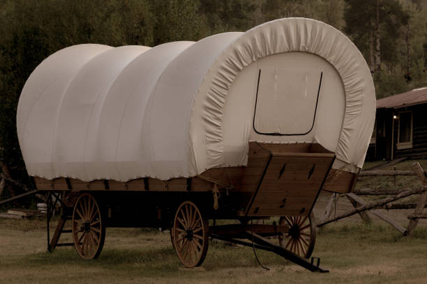 istock Old West American Covered Wagons 1143498650
