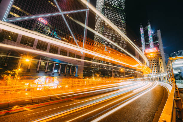 istock car light rail through downtown of Hong Kong 1143500705