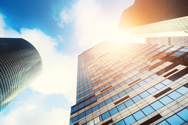 istock Modern glass skyscrapers against the blue sky 1143502056