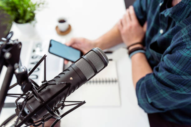 Presenter or host in radio station hosting show for radio live in Studio stock photo