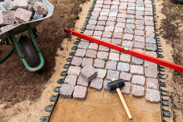 istock landscaping and garden services - granite cobblestone walkway construction 1143504857