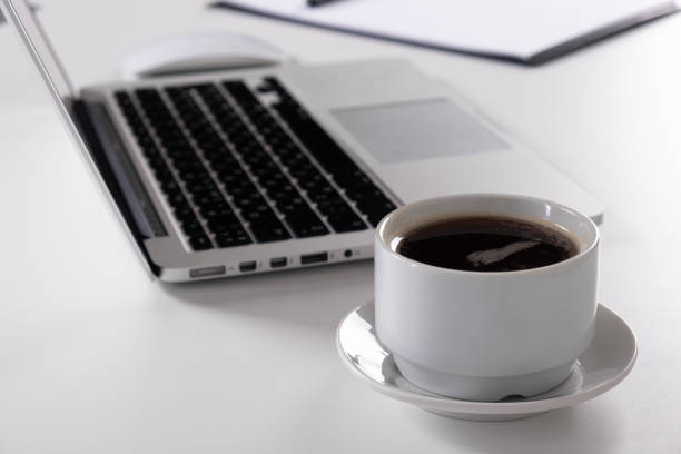 istock Laptop, notebook Tablet and cup of coffee on work desk 1143505164