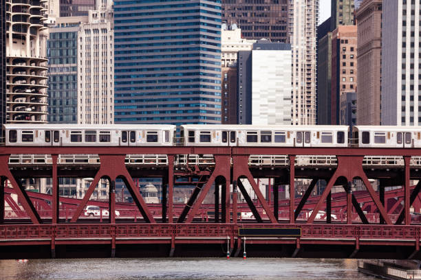 istock Trains running over the metal bridge in Chicago 1143506228