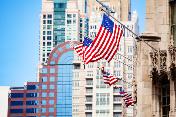 istock American flag, Chicago downtown buildings on back 1143506280