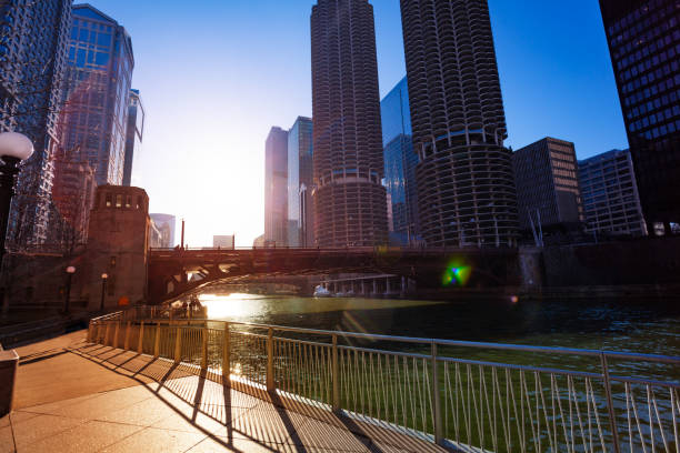 istock Spring sunlight on Chicago river embarkment, USA 1143506344