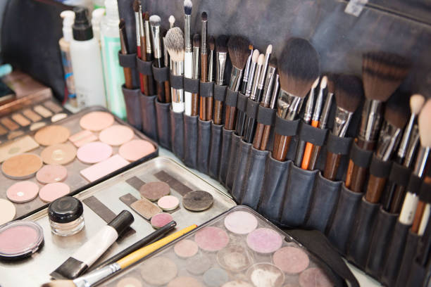 istock Various makeup brushes. Collection of Eye shadows, rouges. 1143508007