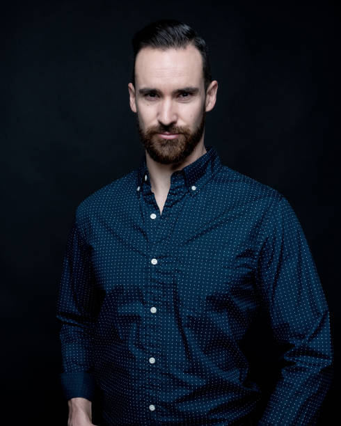 istock Handsome man wearing a blue shirt 1143511181