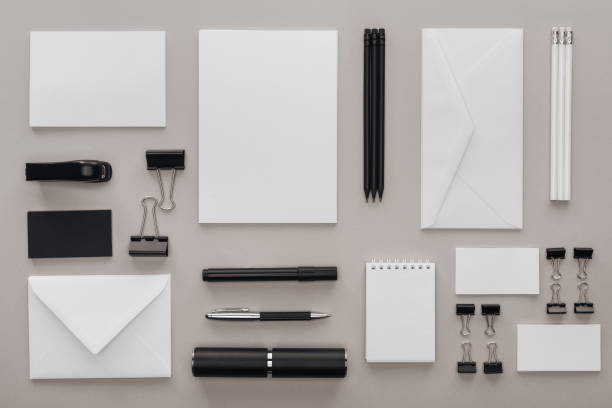 istock flat lay with black and white stationery on grey background 1143512273